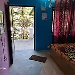 Himalayan Mountain Trekkers And Waterfalls View Homestay