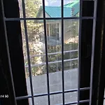 Himalayan Mountain Trekkers And Waterfalls View Homestay