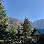 Himalayan Mountain Trekkers And Waterfalls View Homestay